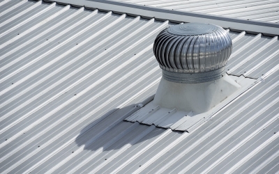 Stainless steel exhaust fan on factory roof